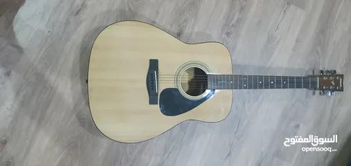  1 Yamaha F310 guitar (with Gator case and 3 picks)