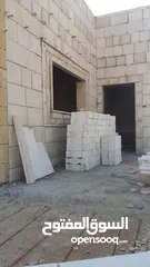  2 تكحيل وبناء الحجر وتنظيف الحجر رملي ومائي والحديد بالرمل