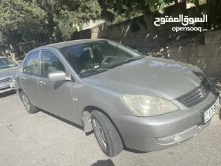  15 ميتسوبيشي لانسر موديل 2010 محرك 1300 سي سي ..الفحص مرفق بالصور