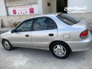  15 هونداي اكسنت قصة الدب هاتشباك موديل 1997 اوتوماتيك للبيع
