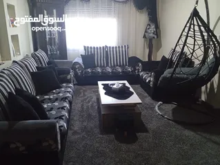  1 طقم كنب لون سكني واسود