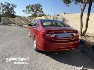  7 ‎هونداي سوناتا بنزين موديل2012 ماشيه 117000 كلم لون احمر للبيع