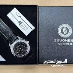  2 ساعة يد مع قداحه الكترونيه داخل باكيت هديه انيق و وصلة الشحن للقداحه   ساعه ساعات ولاعه