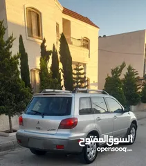  9 متسوبيشي اوتلاندر 2003 بحالة الشرگه
