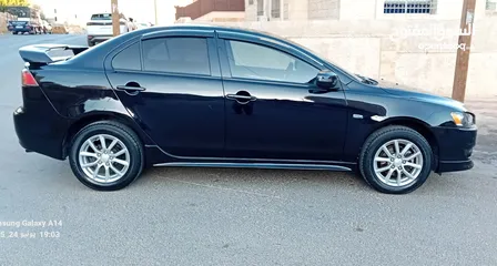  27 متسوبيشي لانسر فراشة موديل 2015 فحص مرفق مع الصور بحالة الوكاااااالة  ماشية 49 الف km  أصلي