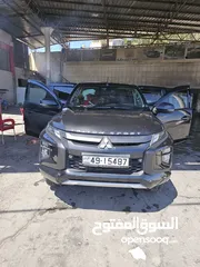  13 ميتسوبيشي l200 sportero