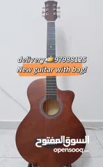  4 New acoustic guitar, with bag and picks, delivery