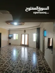  12 منزل للبيع على شارع 100 مطل منطقة جميلة جدا و هاذيه