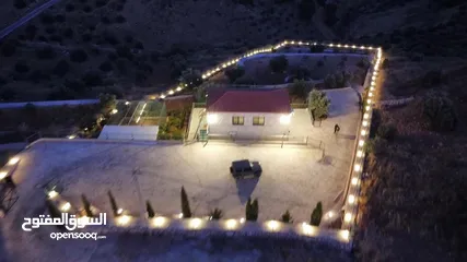  7 مزرعة مميزة في جرش مع بيت طابقين بسعر مميز للبيع