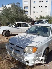  8 سيارة هونداي فيرنا 2003ميكانيكيات جيدة جدا وعيوب بسيطة بالبودي
