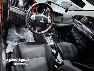  7 ميتسوبيشي لانسر موديل 2015 GT اصلي فحص كامل بحالة الوكاله فل كامل اعلى صنف من فئتها