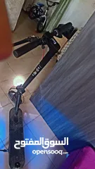  1 اسكوتر كهربائي