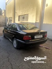  2 BMW 318i 1996