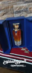  10 عطر خلطه القرشي جديد90مل للرجال والنساء  مع ستاند خشب لون ازرق