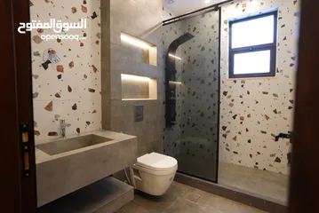  10 شقه مميزه للبيع بعد المدارس العالميه طريق المطار مباشره بسعر مغري تشطيب سوبر ديلوكس