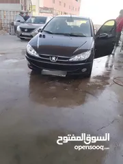  2 للبيع المستعجل بيجو 206 موديل 2007 فحص 7 جيد لون اسود