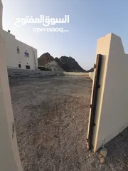  3 أرض سكنية ف العامرات النهضة مرحلة 10 قريبه من مسجد الرساله مسورة وجاهزة للبناء