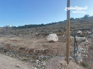  6 دولم أرض للبيع واصلو مياه وكهرباء بسعر مغري