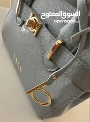  7 New Bebe women’s evie satchel bag