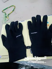  2 كلفز كفوف رياضة أمريكي ماركة HEAD ضد الماء water proof بحالة الجديد.. ميزة استخدام التصفح في الهاتف