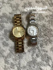  2 Michael Kors and Armani Exchange Women’s watches. Used but in good condition.