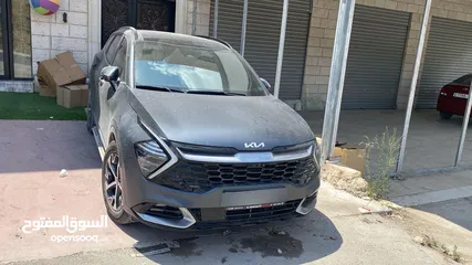  12 كيا سبورتاج هايبرد 2022