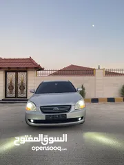  1 كيا لوتزي 2006 3 جيد لون سلفر ماتور 2000cc