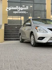  2 Nissan Versa Sv