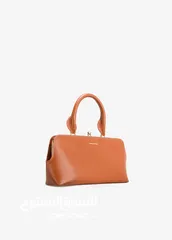  9 Women's genuine leather bag / حقيبة نسائية من الجلد الطبيعي