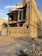  9 ببيت للبيع في حي بغداد ركن طابقين سعر 260 وبيه مجال