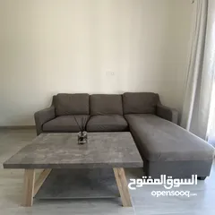  3 Comfy Sofa with a table