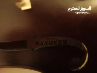  7 كمان ساندنر (Sandner) بحالة ممتازة مع جميع مستلزماته.