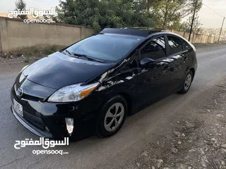  2 تويوتا بريوس 2015 هايبرد فل كامل مع بانوراما أعلى صنف بكج ( 5) لون اسود مميز