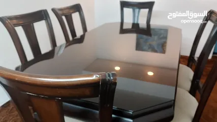  1 طاوله سفره جميله وبحاله جيده ست كراسي