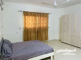  9 شقة مفروشة للإيجار Ground floor apartment with a front garden for rent on Al-Mala'ab Street in Qalqi