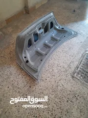  13 غطاء خلفي بدون فصالات وزرفيل، سيارة نيسان صني 2011