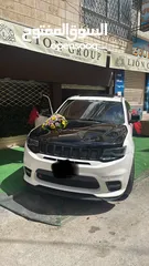  7 جيب شيروكي ملك العضلات الامريكي SRT8  موديل 2014 لون ابيض للايجار فقط من عند مكتب Lion  Group