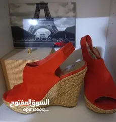  18 أحذية جديدة ونظارات شمسية أصلية دولتشي وغوتشي وشانيل وقطع فضة مميزة
