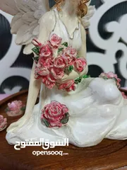  7 اضاءة غرفة  جانبيه على شكل ملاك الاضاءه بالالوان متعدده