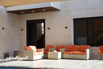  12 تل الرمان شمال عمان قرب عسل الترياق جسر مرصع قبل جامعة فيلادلفيا ومحطة تل الرمان للمحروقات