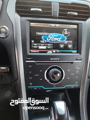  22 فورد فيوجن 2015 اعلى صنف تيتانيوم اصلي  بدون فتحه فحص كامل 7جيد