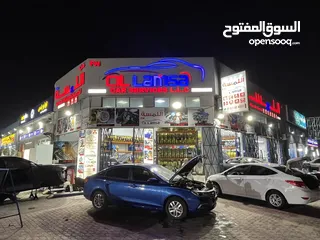  2 قراج للبيع جنب سوق السيارات عجمان مجهز بالكامل موقع ممتاز garage with license and equipment for sale