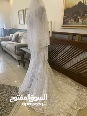  6 فستان عرس راقي موديل سمكة مع طرحة