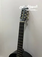  2 قيتار اسود للبيع من ماركه melody معه شنته سوداء للبيع بسعر 40 دينار الموقع اربد