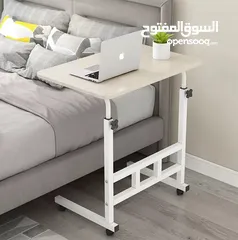  14 الطاولة الجانبية المتحركة – عملية وأنيقة   تصميم عصري يناسب أي زاوية بالبيت ويضيف لمسة مرتبة.