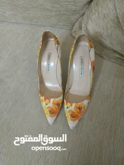  1 Manolo Blahnik heels  handmade in Italy