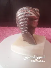  4 مجسم نحاس احمر وقاعده حجر