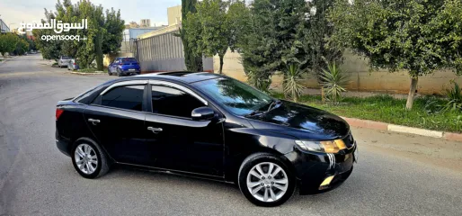  8 كيا فورتي فل مع فتحه سقف وبصمه 2011 اصل برايفت