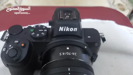  7 كاميرا نيكون Z5 مع العدسة الوكالة + جهاز لاقط الفيديو لاسلكي