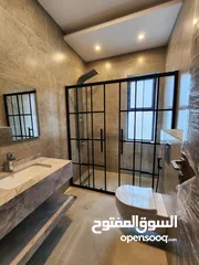  12 شقة مع روف دوبلكس للبيع في منطقة الظهير - ref : 14490